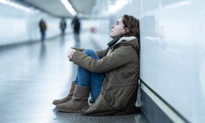 Woman Sitting in the Aisle